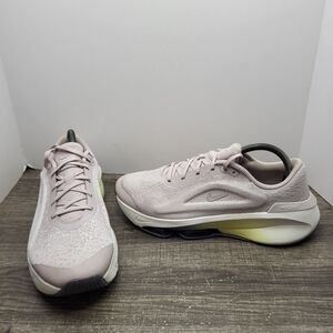 Nike Women's Pale Pink Running Sneakers with Yellow Midsole Accent